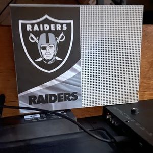 one small burn on the corner console works and comes with games and my account